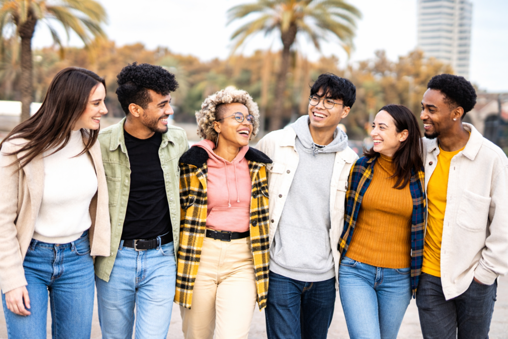 smiling friends in a vibrant park